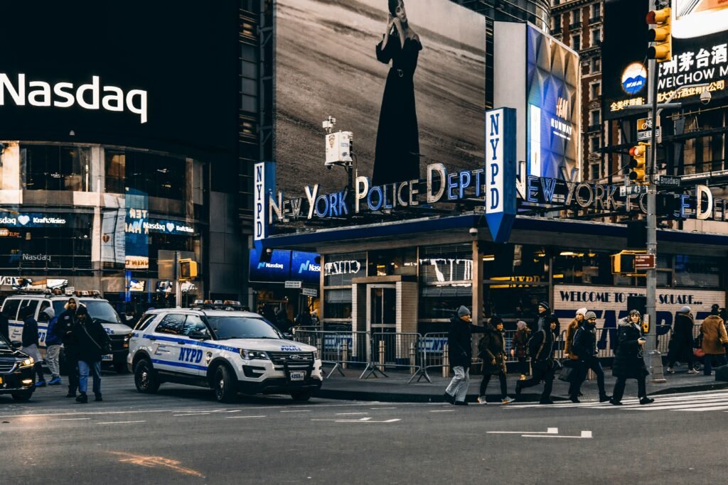 New York City with Nasdaq logo
